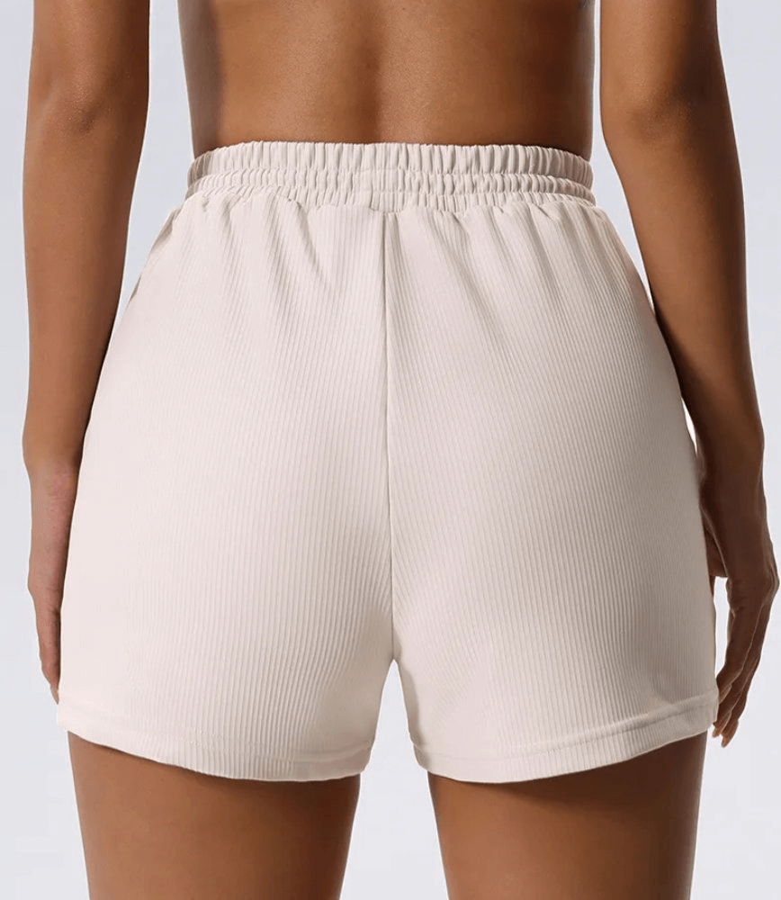Back view of stylish women's ribbed yoga shorts SF2206 for active wear with pockets, perfect for yoga, fitness, and casual outings.